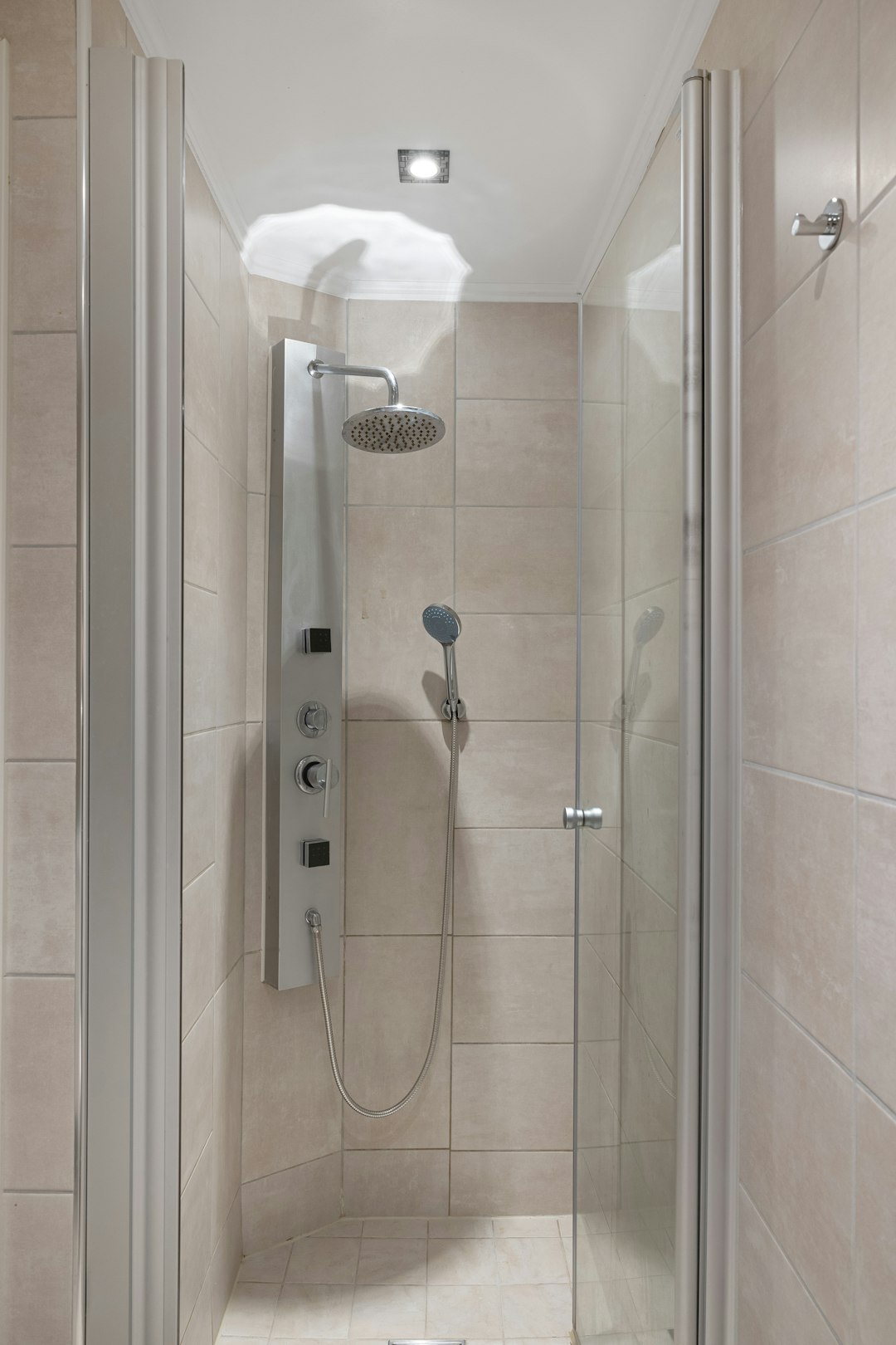 a-walk-in-shower-sitting-inside-of-a-bathroom-fhsjke5eo0s